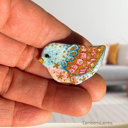 Hand painted bird brooch in blue pink and gold